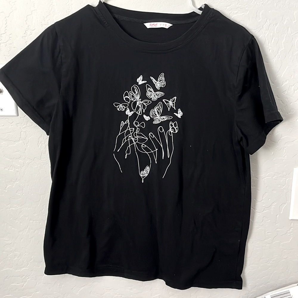 oversized tee but runs a little small